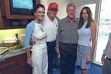 Bill_Clinton_and_Donald_Trump_at_the_U.S._Open_in_2000,_Flushing_Meadows–Corona_Park_043110.jpg