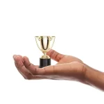 64450498-2d6c-4d08-9598-d692083af875par022un-small-gold-trophies-hand.webp